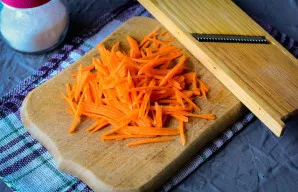 Grate the carrots.