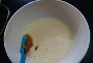 Add garlic paste, sugar and salt. Beat again with a mixer.