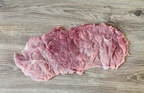 Beat the meat well, add salt and pepper.