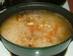 We transfer the baked vegetables to a saucepan with meat, put a bay leaf, lay pearl barley on top (thoroughly washed). Pour water so that...