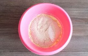 Add flour, baking powder. Start mixing with a fork, as soon as the dough comes together, add a tablespoon of butter and knead with your h...