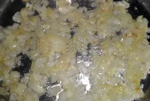 Chop the onion finely too. Fry in vegetable oil until golden brown.