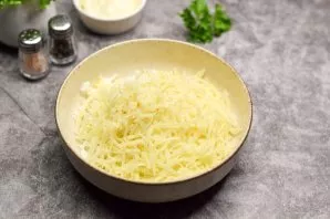 Also grate the hard cheese and add to the eggs.