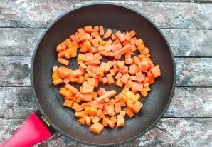 Peel the pumpkin, remove the bark, seeds and cut into small cubes. Pour a little vegetable oil into the pan, put the pumpkin and fry for ...