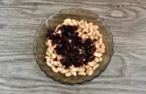 Carefully pour out the canned beans from the liquid and put them in a salad bowl. Peel the boiled beets and cut into small cubes. Add to ...