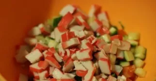 Next, chop the crab sticks.