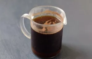 Pour ground coffee with cold water. Put in the refrigerator for 15-16 hours. Then filter.
