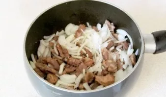 Add finely chopped onion, salt and spices. Stir and cook until the onions are soft.