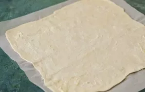 Grease it with butter.