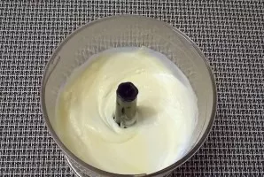 In another bowl, mix cottage cheese, sour cream, and eggs until smooth. Add powdered sugar, pudding and beat again until smooth.