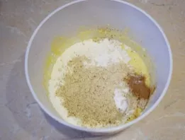Then add starch, soda, cinnamon and chopped almonds to the dough. Mix the dough well so that the nuts are evenly distributed throughout t...