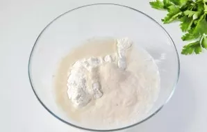 In a deep bowl, add flour and salt. Add the risen yeast.