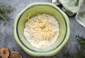 Grate the butter into flour and rub it quickly with your hands until a fine crumb forms.