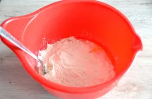 Add flour, knead the dough.