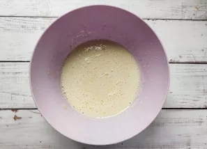 Use a mixer to beat eggs with sugar until fluffy. Melt the butter in the water and pour it into the egg mixture.