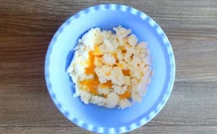 Beat in the egg. Mix it up.