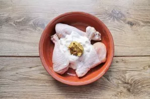 Add mustard to chicken and sour cream.