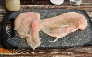 Season with salt and pepper on both sides.