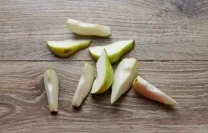 Cut the pear into slices and remove the core.