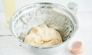 Then add flour and knead the dough.