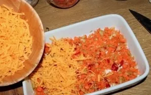 Peel the vegetables and coarsely grind them. Alternatively, carrots can be grated on a coarse grater, celery - thin slices, and peppers -...
