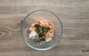 Finely chop the dill and add to the bowl with the cream cheese and shrimp.