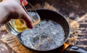 Pour light beer into the melted butter.