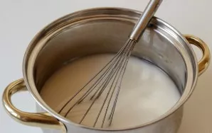Stir, strain the liquid through a fine sieve. Add sweetener and heat the liquid over medium heat, stirring constantly.