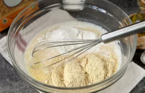 Mix both types of flour, salt and sugar.