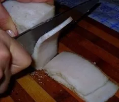 Bacon cut into pieces.