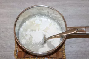 Add a quarter cup of flour, mix well.