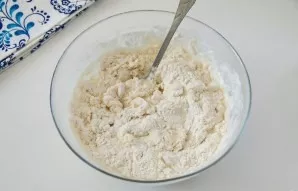 Add flour in portions.