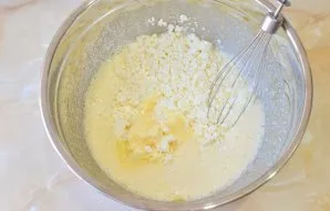 Then put soft butter and cottage cheese in a bowl. Mix.
