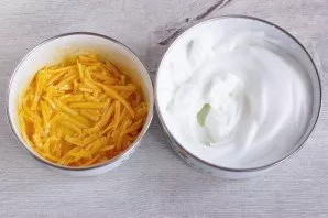 Grate the cheese on a coarse grater. Set aside 1/3 part to the top crust of cheese, mix the rest with the yolks. Beat the proteins until ...