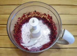 Pour in the milk and continue to mix.