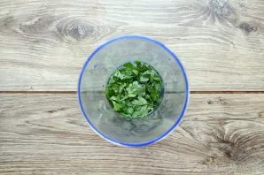 Pour clean cold water into the blender bowl.