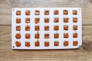 Pour the hot mass into a candy mold and cool completely. If there is no candy mold, just pour the mass into a suitable form, smeared with...
