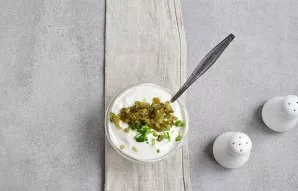 Finely chop the jalapena and onion letters and add to the sauce.