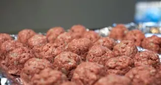 From the prepared mass form balls of medium size.