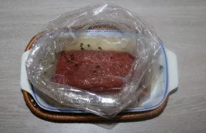 Put the meat in the bag.