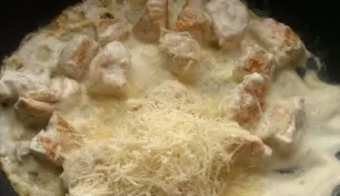 Grate the cheese on a fine grater and add to the meat along with salt and pepper.