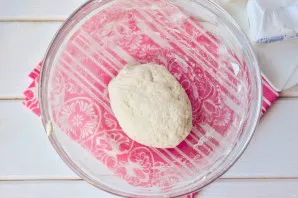 Knead the dough with your hands.