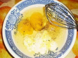 Now we make the dough: we beat the eggs with spices, salt and mayonnaise. It is not necessary to use a blender, this can be done with a r...