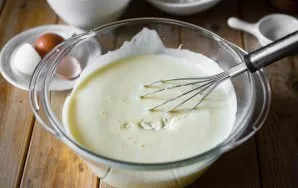 Add melted butter, kefir, salt, soda to eggs whipped with sugar.