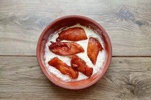 Roll the pickled pieces in flour.