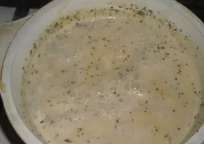 While everything is cooking, prepare the sauce. Heat the cream on the fire. Add basil, cheese, spices, pepper and salt. Boil the sauce un...