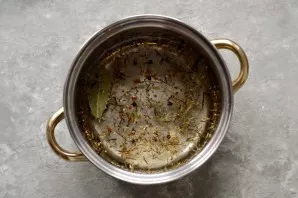 Prepare the marinade. Add sugar, salt and all spices to the water. Bring to a boil. Add citric acid and remove from heat.