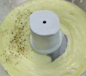 With a spatula, scrape off the mayonnaise from the sides of the dish or bowl. Add salt, pepper and beat the mayonnaise to the desired con...