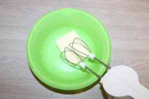 Beat the butter with a mixer.