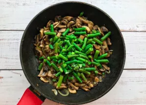 Add the green beans and mix well.